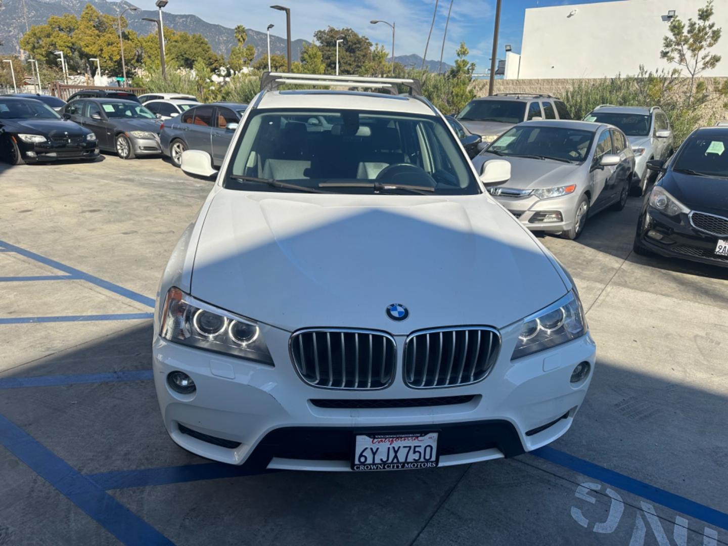 2013 WHITE BMW X3 xDrive28i (5UXWX9C52D0) with an 3.0L L6 DOHC 24V engine, 8-Speed Automatic transmission, located at 30 S. Berkeley Avenue, Pasadena, CA, 91107, (626) 248-7567, 34.145447, -118.109398 - Crown City Motors is a used “Buy Here Pay Here” car dealer in Pasadena CA. “Buy Here Pay Here” financing, means that when you purchase your vehicle from our dealership, that you make the payments to the dealership as well. We do not need the banks approval to get you approved for a used auto - Photo#5